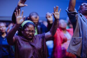 what is prayer- people praising with lifted hands