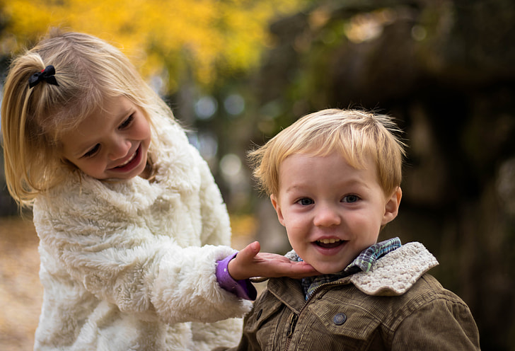 Girl and boy playing 