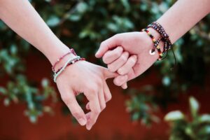 bible verses about friendship - two hands holding