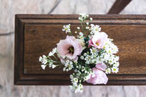 Bible verses for funerals - casket with flower