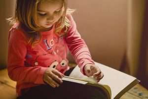 little girl reading