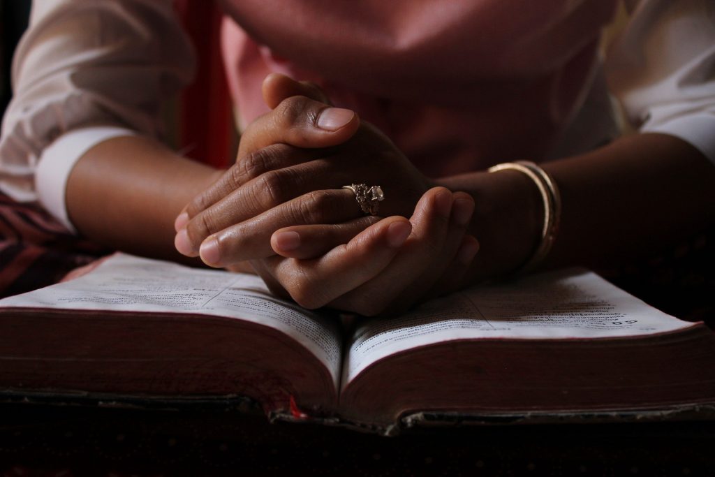 Woman Praying, Bible