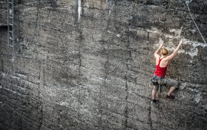 person climbing on wall
