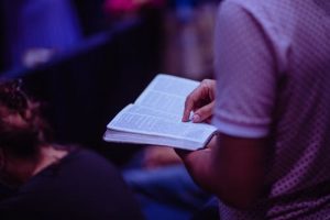 person holding a Bible