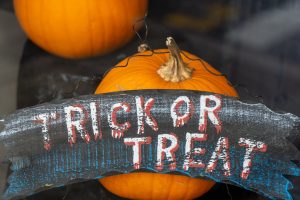 pumpkin with trick or treat sign, should christians celebrate Halloween