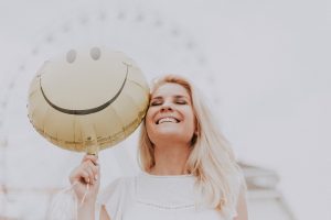 fruits of the Spirit KJV- woman holding a yellow baloon