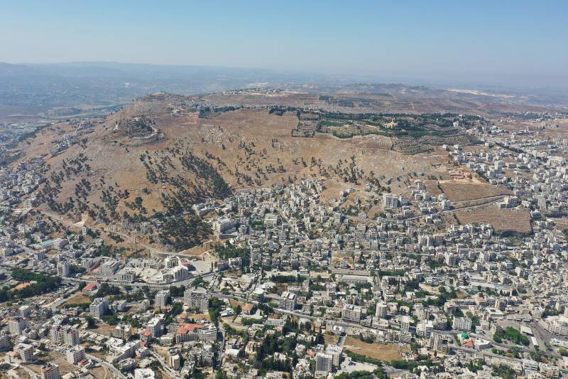 aerial view of mount gerizim, many buildings established on the mountain peak