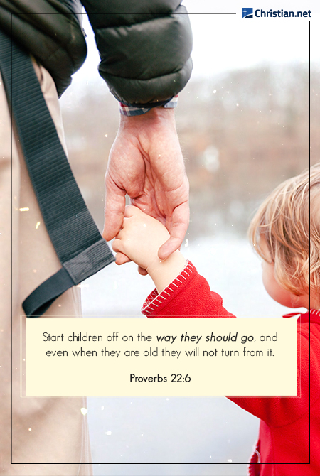 zoom in focused on parent holding a child's hand, bible verse for young girls